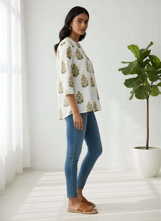 Elegant off-white top with yellow flower print
