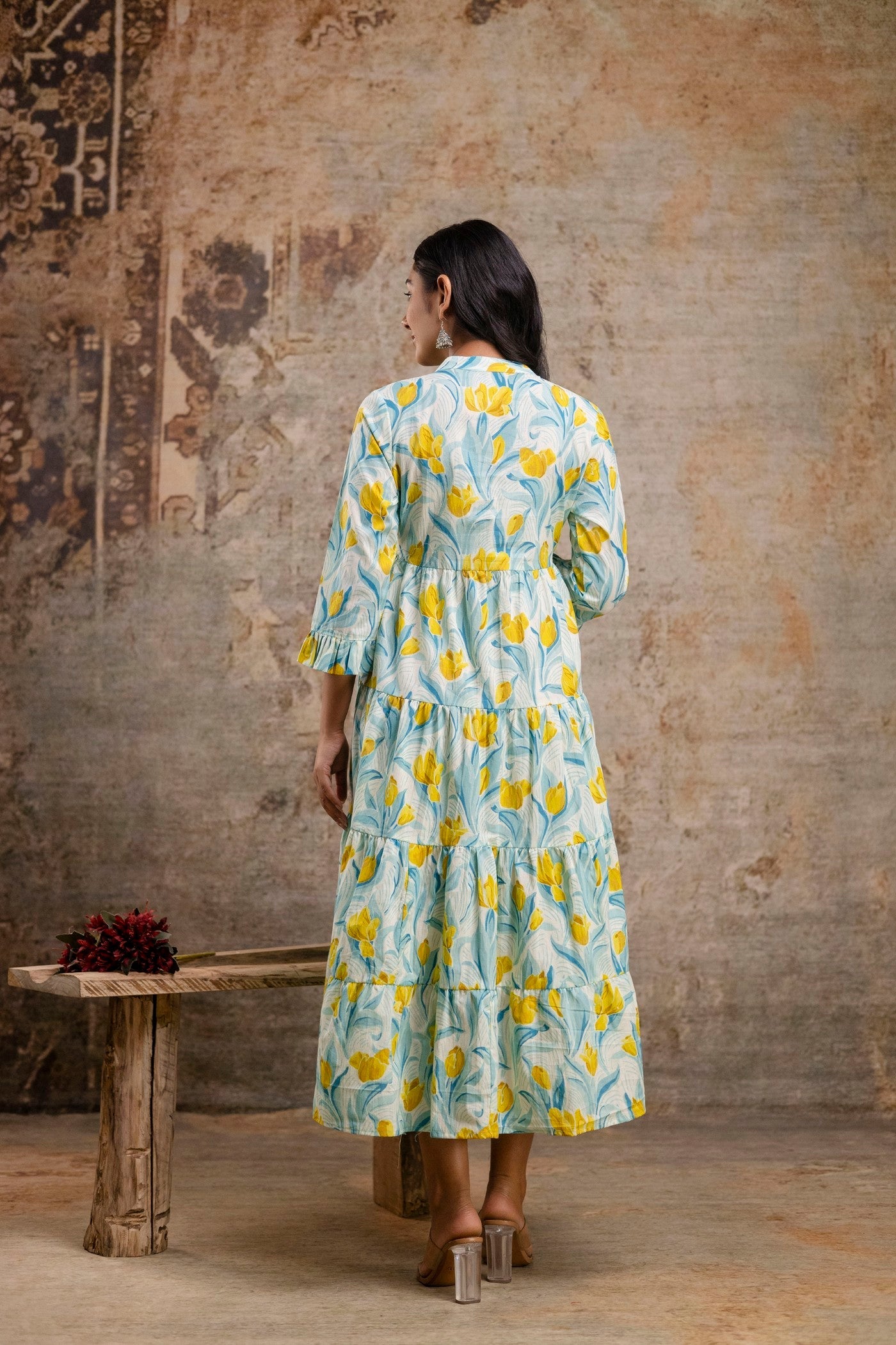 Front view of yellow floral printed middy dress