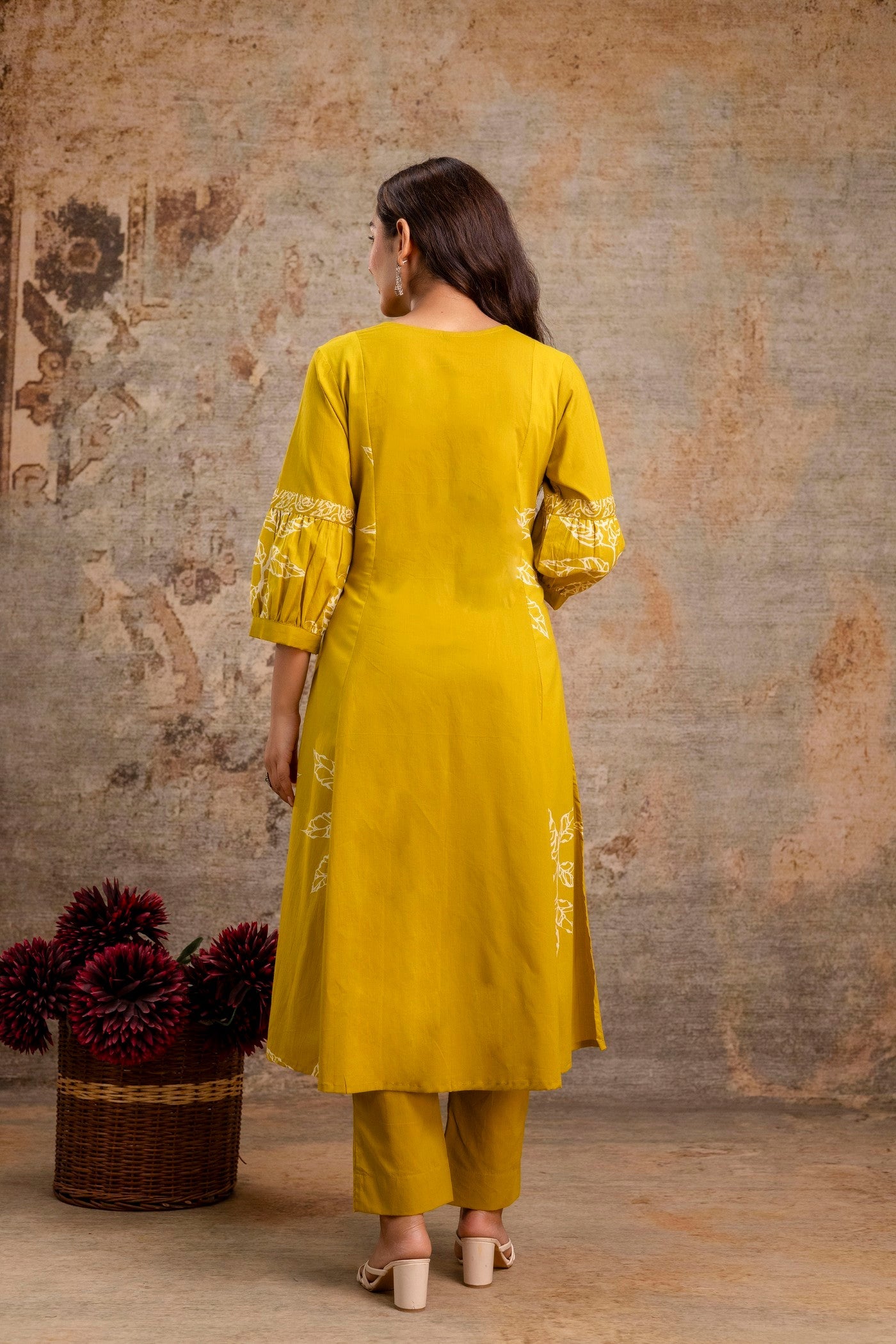 Indian traditional outfit in mustard color