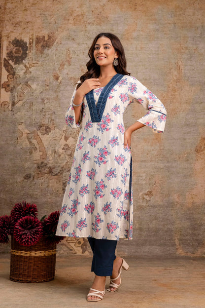 Light yellow kurta set with floral pattern