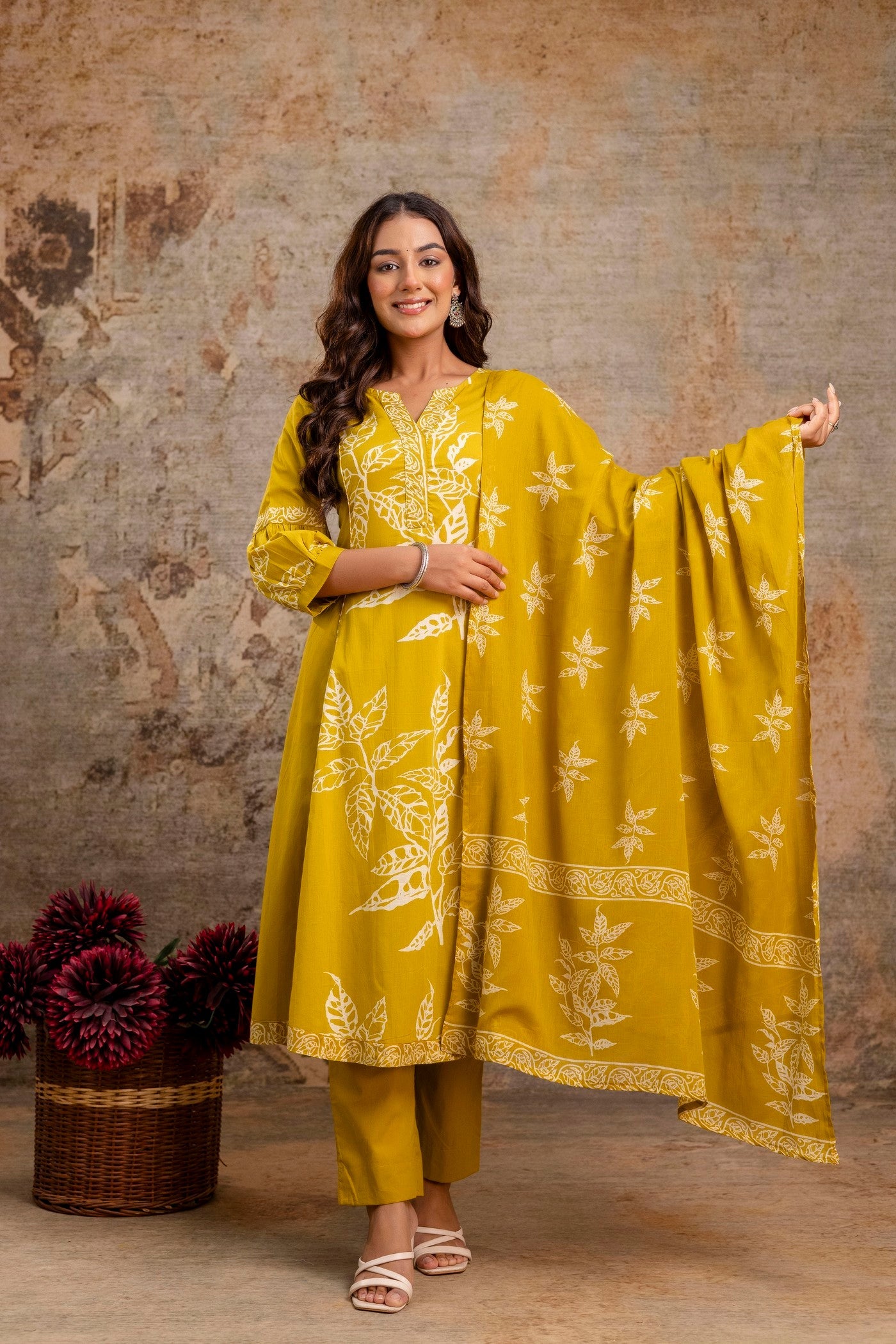Woman in mustard yellow cotton dupatta set
