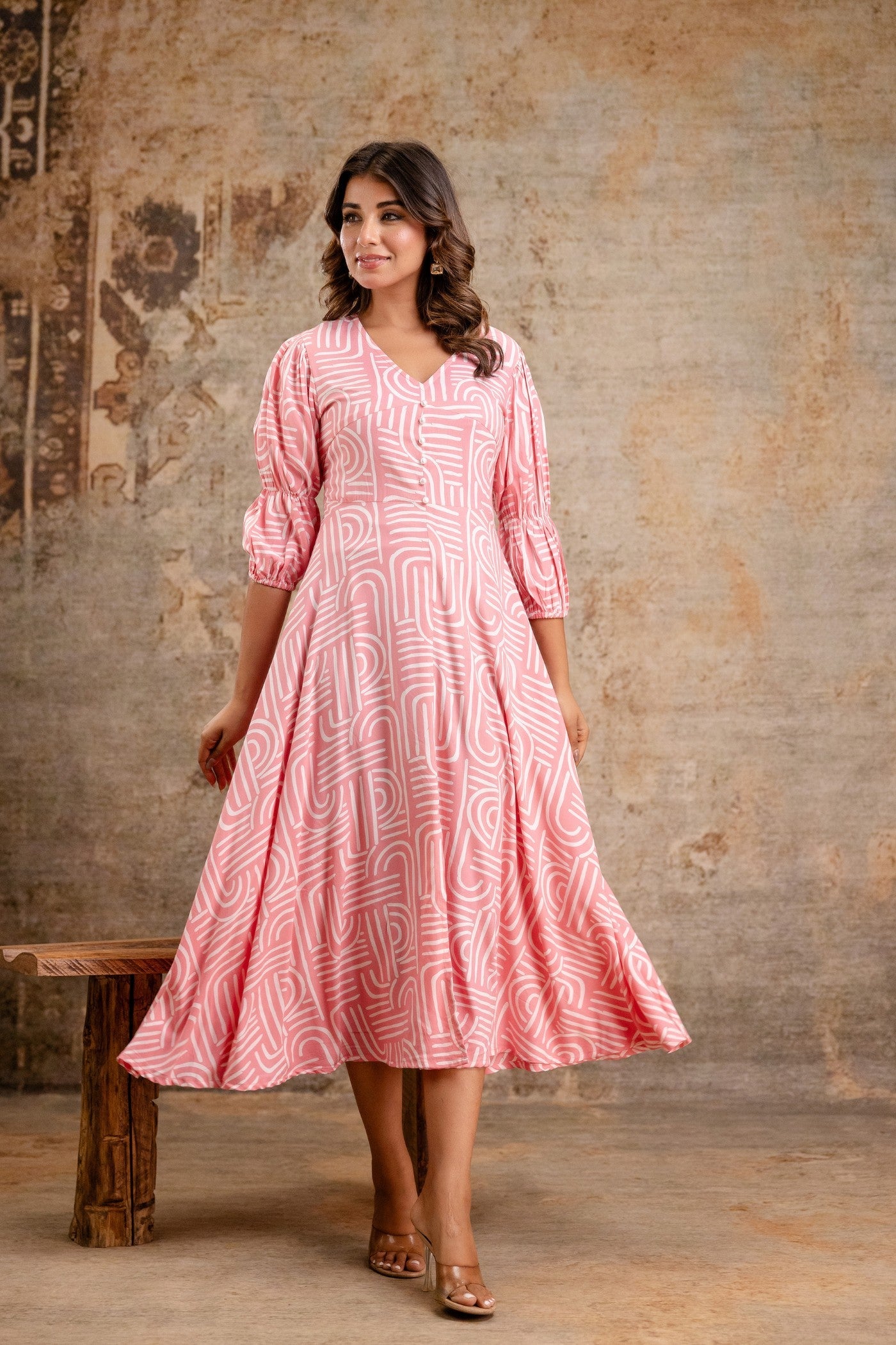 Women's pink midi dress with puff sleeves